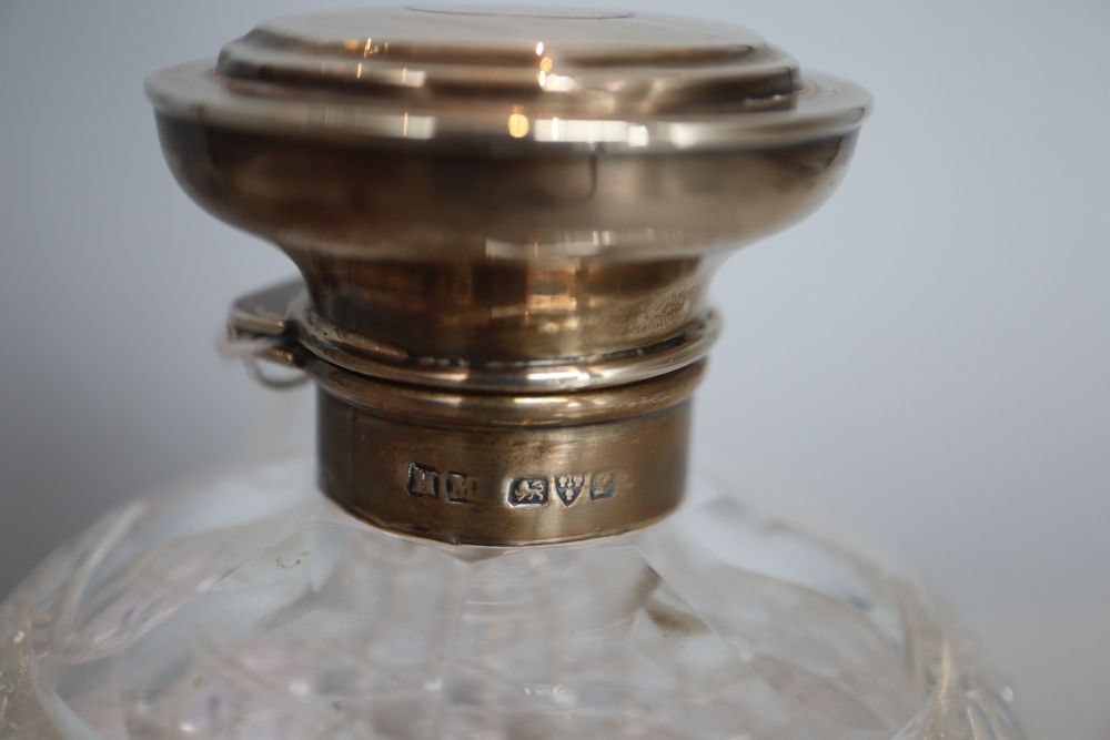 An Art Deco silver-mounted square section glass decanter, Hukin & Heath, Birmingham 1922, 35.5cm and a cut glass scent bottle,